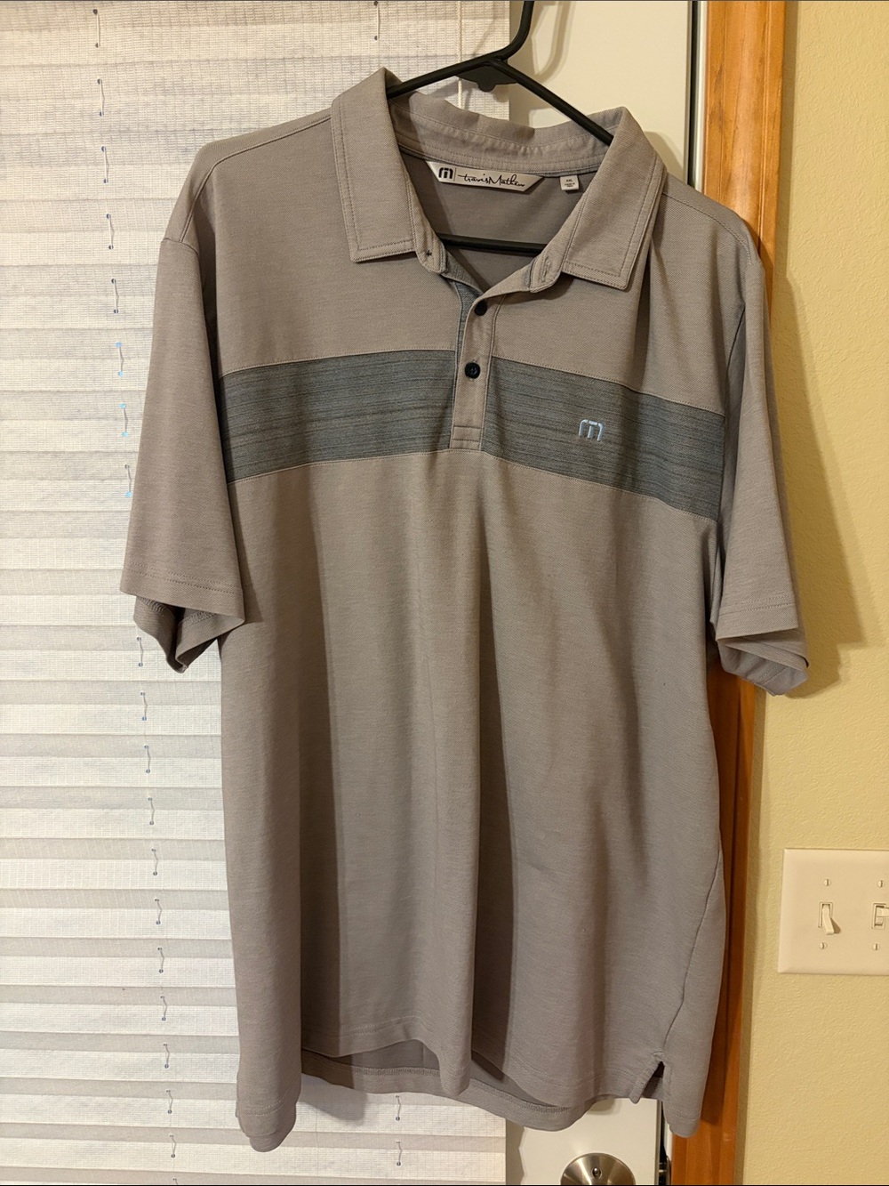 Travis Mathew Men’s Light Gray Polo with Dark Gray Chest Stripe